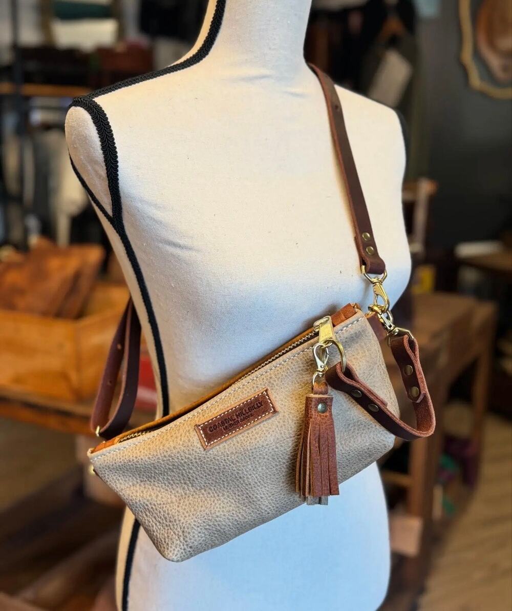 Coastal hillbilly Lil Vacation wristlet with tassel. No crossbody strap